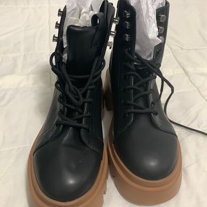 New never worn black boots excellent condition with stock branding